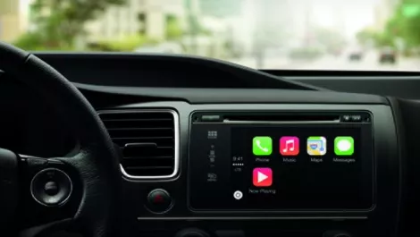 Apple puts iOS on your dashboard with Apple CarPlay...
